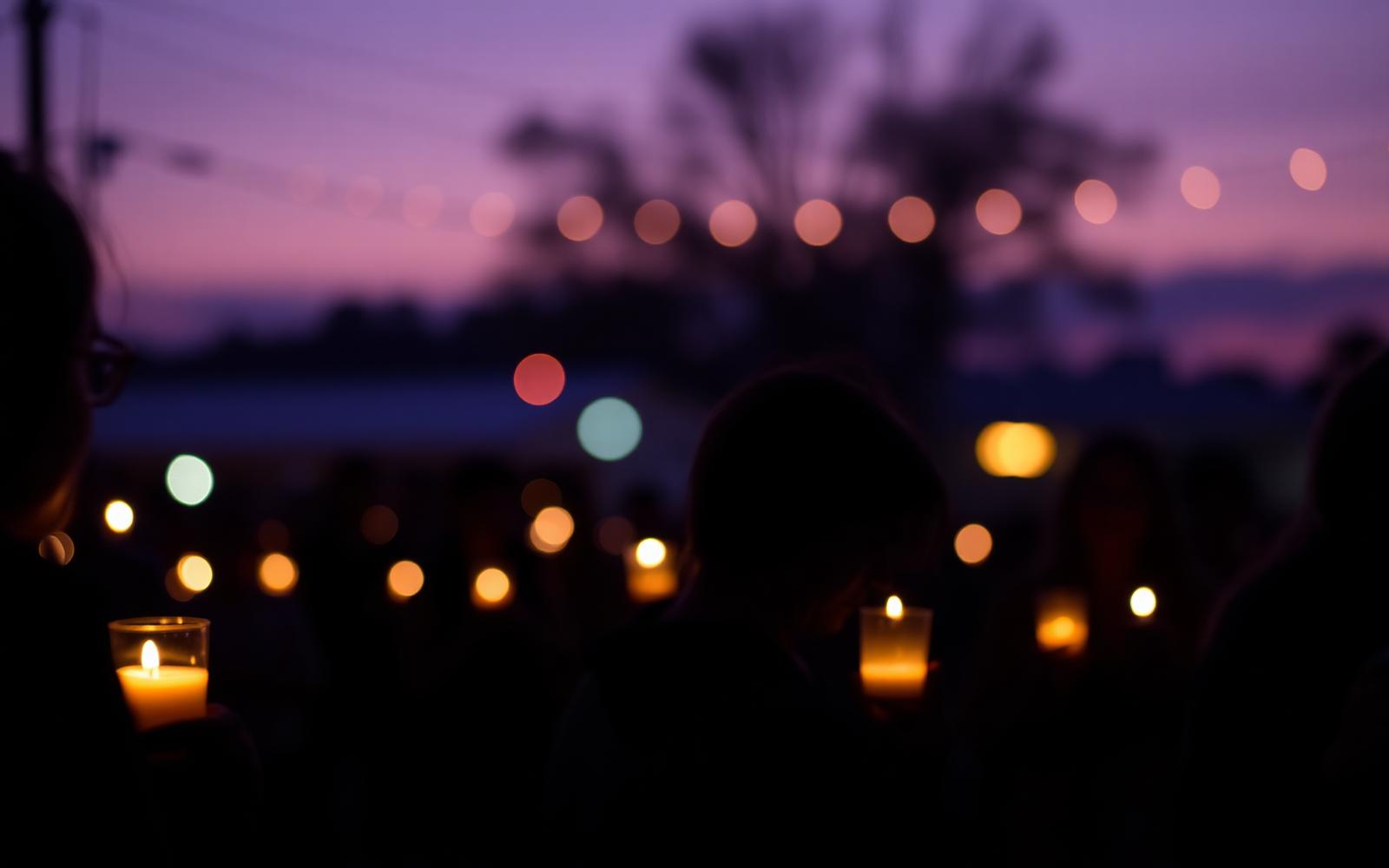 Candlelight vigil at dusk honoring 4-year-old Javeayah Harris in Aiken County, South Carolina